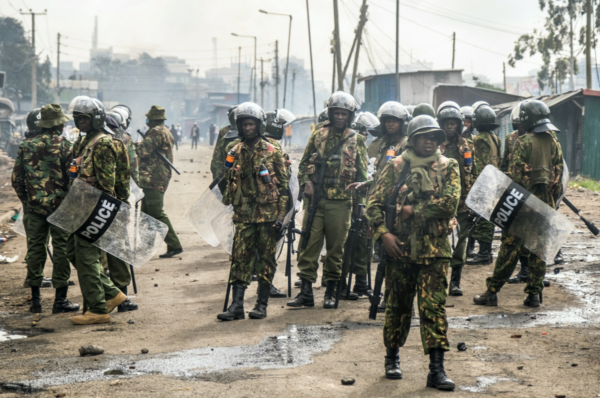 Riot police officers disperse supporters of Kenya's opposition leader Raila Odinga of the Azimio La Umoja One Kenya Alliance, as they participate in an anti-government protest against the imposition of tax hikes by the government, in Shauri Moyo estate near Kamukunji grounds in Nairobi, Kenya, on 12th July, 2023. 