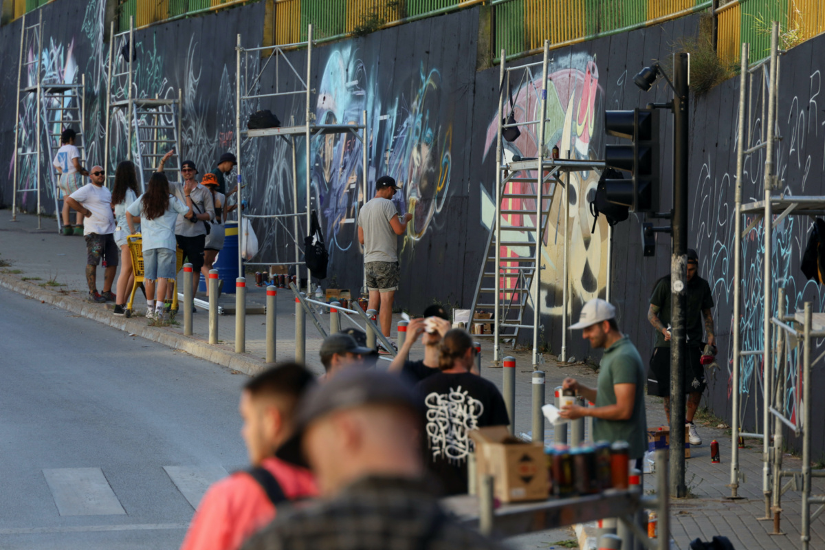 Graffiti artists paint murals as part of the Meeting of Styles graffiti festival in Kosovo's capital Pristina, Kosovo, on 28th July, 2023. 