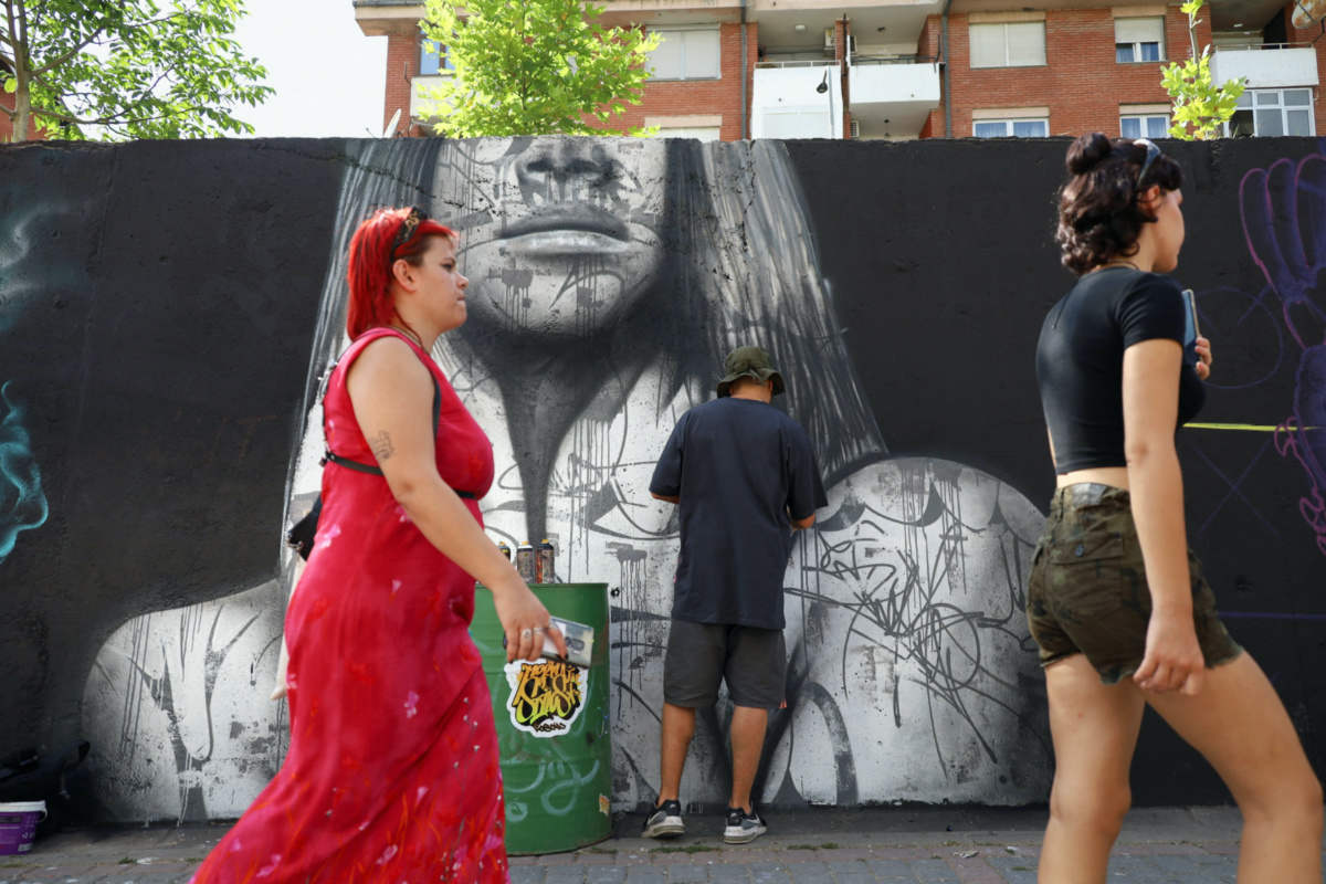 Swalt, a graffiti artist from Switzerland, paints a mural as part of the Meeting of Styles graffiti festival in Kosovo's capital Pristina, Kosovo, on 29th July, 2023. 