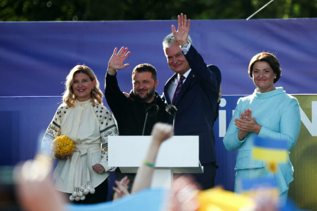 Ukrainian President Volodymyr Zelenskiy, his wife Olena Zelenska, Lithuanian President Gitanas Nauseda and his wife Diana Nausediene attend a ceremony during which a Ukrainian flag from the frontline of the war with Russia is delivered by activists, on the sidelines of a NATO leaders summit in Vilnius, Lithuania, on 11th July, 2023.