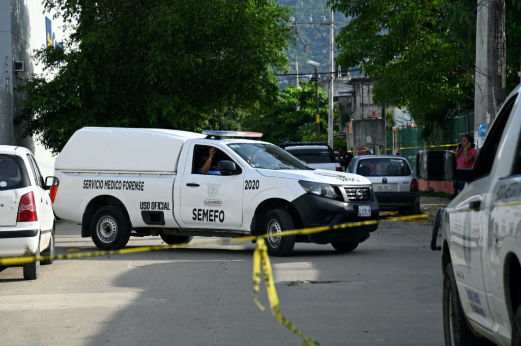 A general view of a Forensic Medical Service vehicle behind barricade tape at the crime scene, following the death of Mexican journalist Nelson Matus, in Acapulco, Mexico, on 15th July, 2023 in this handout image.