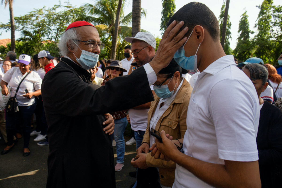 Nicaraguan Roman Catholic Cardinal Leopoldo Brenes blesses a devotee during a Good Friday procession at the Metropolitan Cathedral as the government banned Holy Week street processions this year due to unspecified security concerns, in Managua, Nicaragua, on 7th April, 2023. 