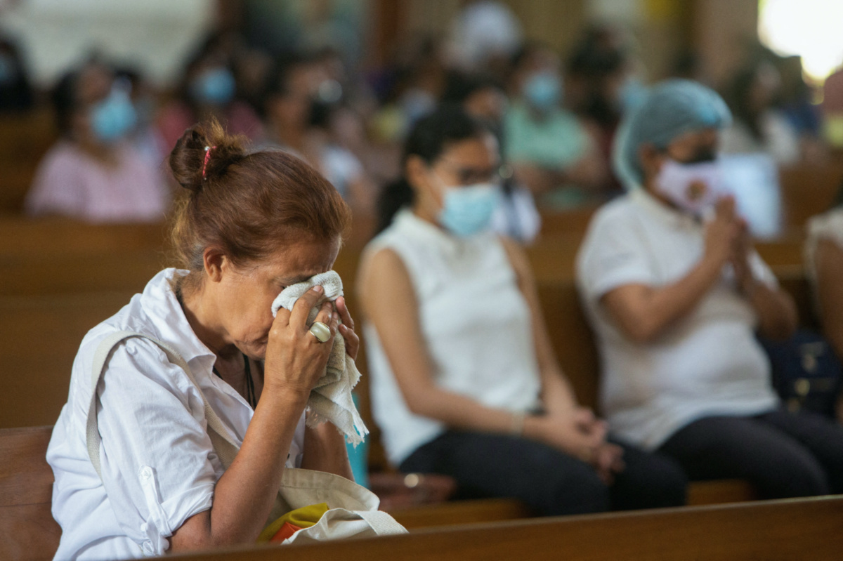 A parishioner reacts during a mass at Metropolitan Cathedral in Managua, Nicaragua, on 21st August, 2022. 