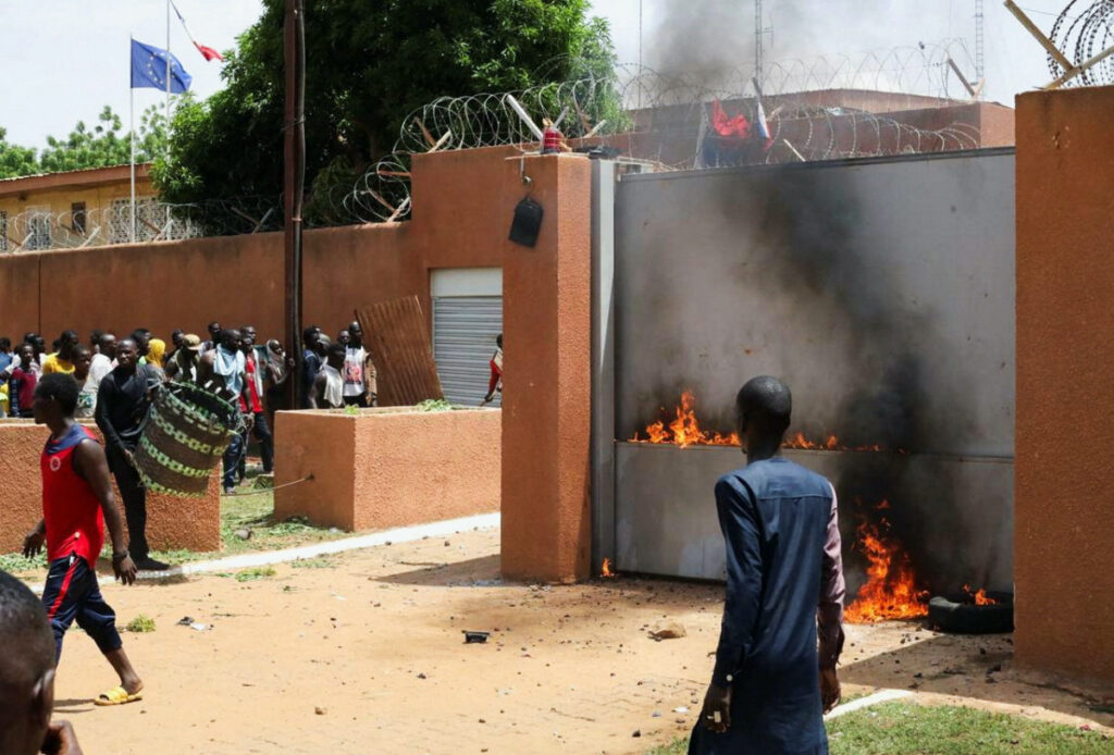 Pro-junta demonstrators gathered outside the French embassy, try to set it on fire before being dispersed by Nigerian security forces in Niamey, the capital city of Niger, on 30th July, 2023.