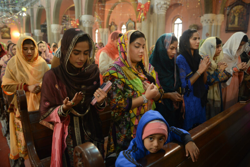 People attend the Christmas service at the Sacred Heart Cathedral in Lahore, Pakistan, December 25, 2018