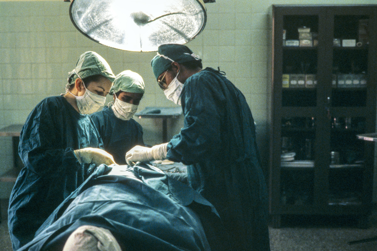 Missionary medical doctor Rebekah Naylor, left, assists in surgery at Bangalore Baptist Hospital in Bangalore, India, in 1983. 