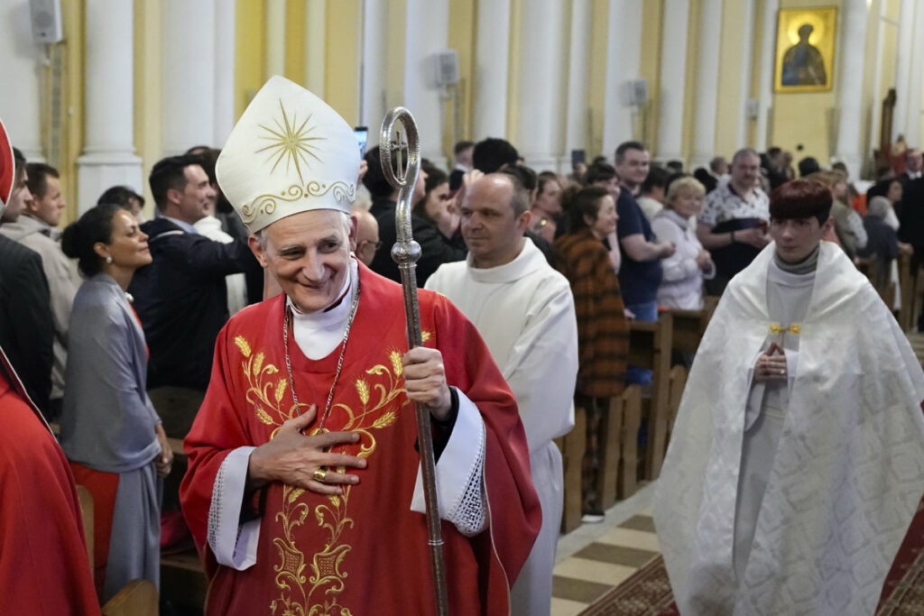 Cardinal Matteo Zuppi welcomes parishioners after celebrating Mass at the Cathedral of the Immaculate Conception in Moscow, on Thursday, 29th June, 2023.
