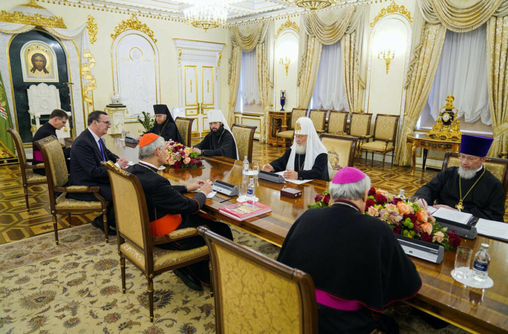 Russian Orthodox clergy and Patriarch Kirill, right side of table, meet with Cardinal Matteo Zuppi and Roman Cathoic delegates at the Patriarchal Residence in Danilov Monastery, in Moscow, Russia, on Thursday, 29th June, 2023.