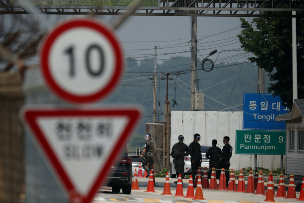 Soldiers stand guard at a checkpoint on the Grand Unification Bridge which leads to the inter-Korean Kaesong Industrial Complex in North Korea, just south of the demilitarized zone separating the two Koreas, in Paju, South Korea, on 17th June, 2020.