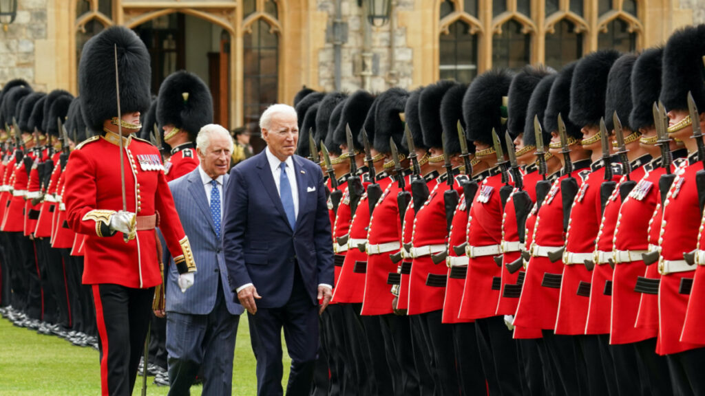 US President Joe Biden participates in a ceremonial arrival and inspection of the honour guard with Britain's King Charles III at Windsor Castle in Windsor, Britain, on 10th July, 2023.