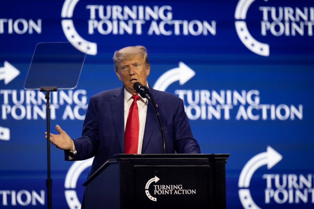 Former US President and Republican presidential candidate Donald Trump gestures as he speaks during the Turning Point Action Conference in West Palm Beach, Florida, US, on 15th July, 2023