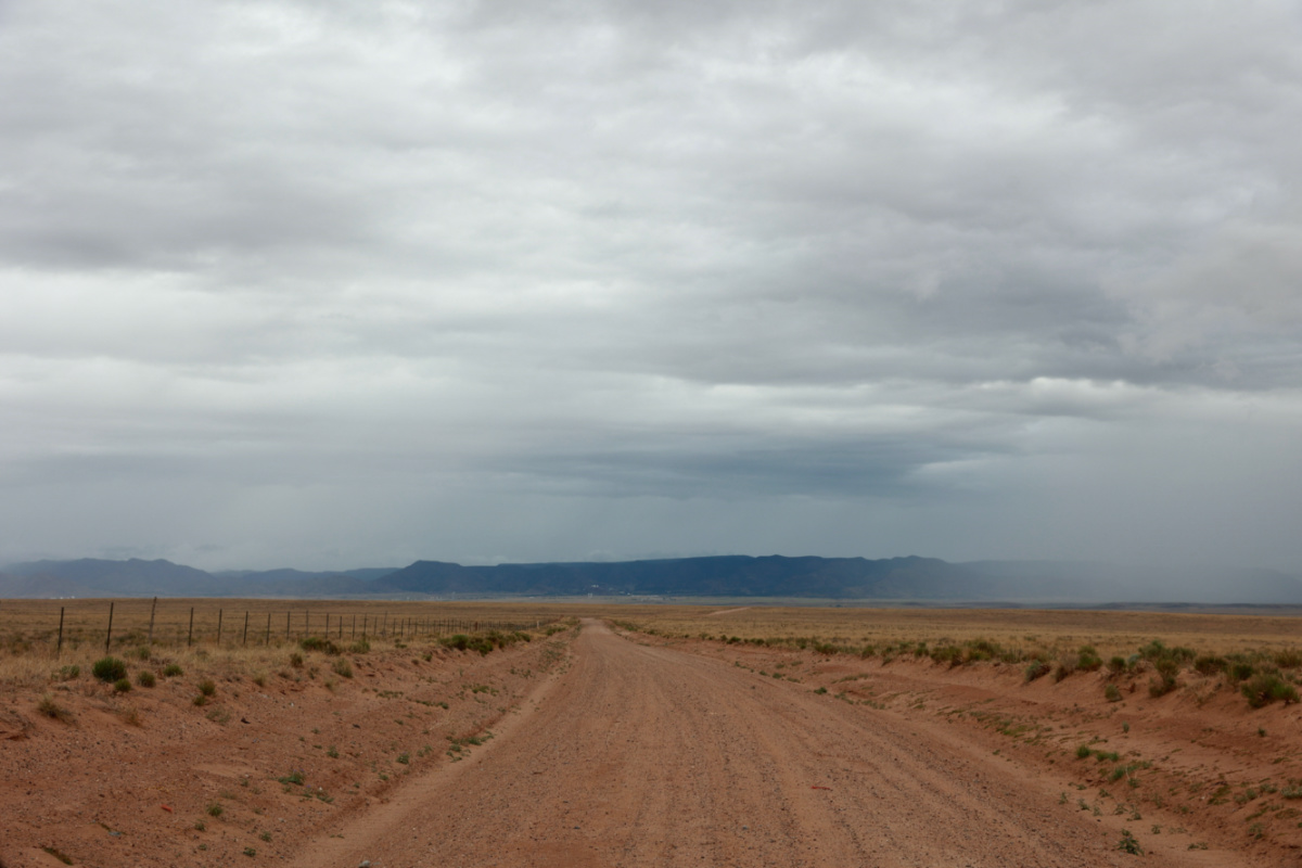 Rain begins to fall on the Manzano Mountains along the Tribal Road 12, in Isleta Pueblo, New Mexico, US, on 19th May, 2023.