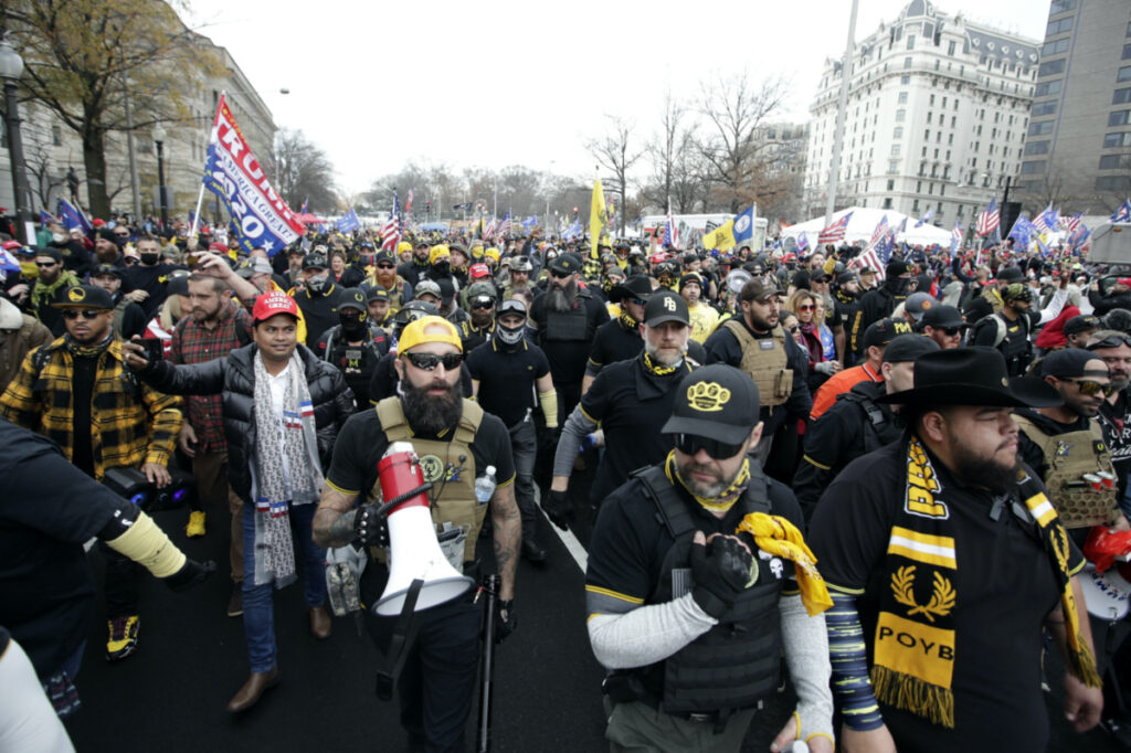 Supporters of President Donald Trump wearing attire associated with the Proud Boys attend a rally at Freedom Plaza, on 12th December, 2020, in Washington.