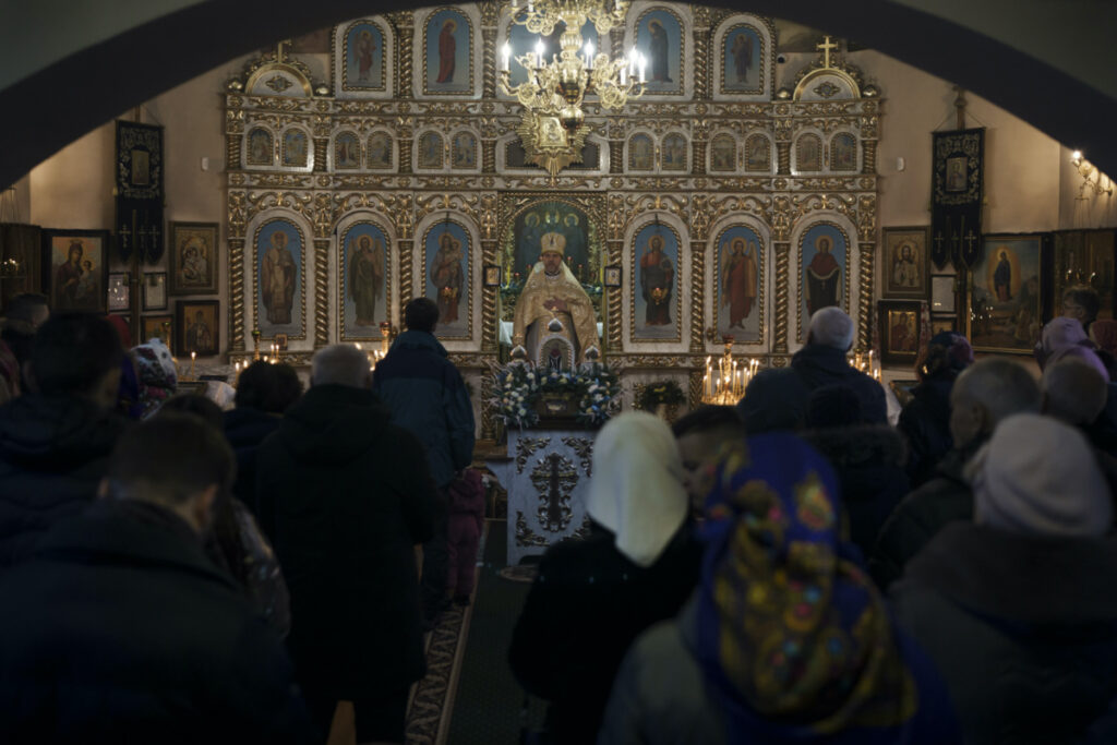 Ukrainians attend a Christmas mass at an Orthodox Church in Bobrytsia, on the outskirts of Kyiv, Ukraine, on 25th December, 2022.