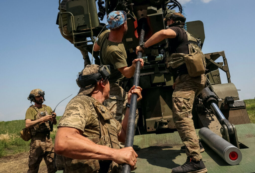 Ukrainian servicemen of the 57th Kost Hordiienko Separate Motorised Infantry Brigade prepare to fire a 2S22 Bohdana self-propelled howitzer towards Russian troops, amid Russia's attack on Ukraine, at a position near the city of Bakhmut in Donetsk region, Ukraine on 5th July, 2023.
