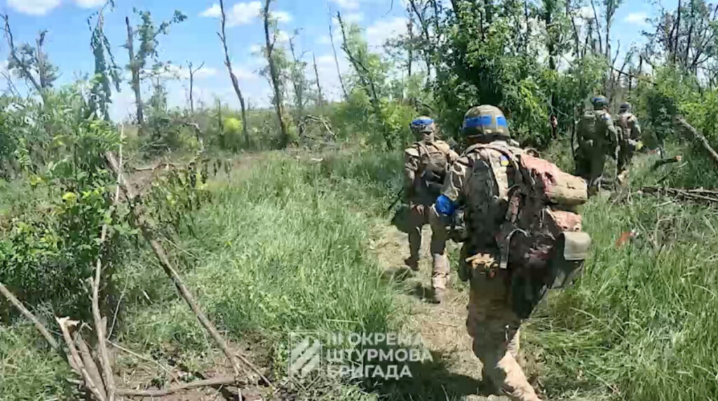 Ukrainian soldiers are seen at their positions on the front line, amid Russia's attack on Ukraine, at the location given as near Bakhmut, Donetsk Region, Ukraine, in this still image obtained from a handout video that was released on 26th July, 2023.