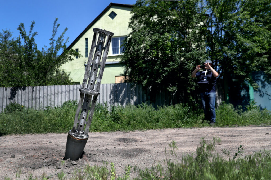 An emptied cluster munition container is seen stuck in the ground following a military strike, amid Russia's attack on Ukraine, on the outskirts of Kharkiv, Ukraine, on 10th June, 2022