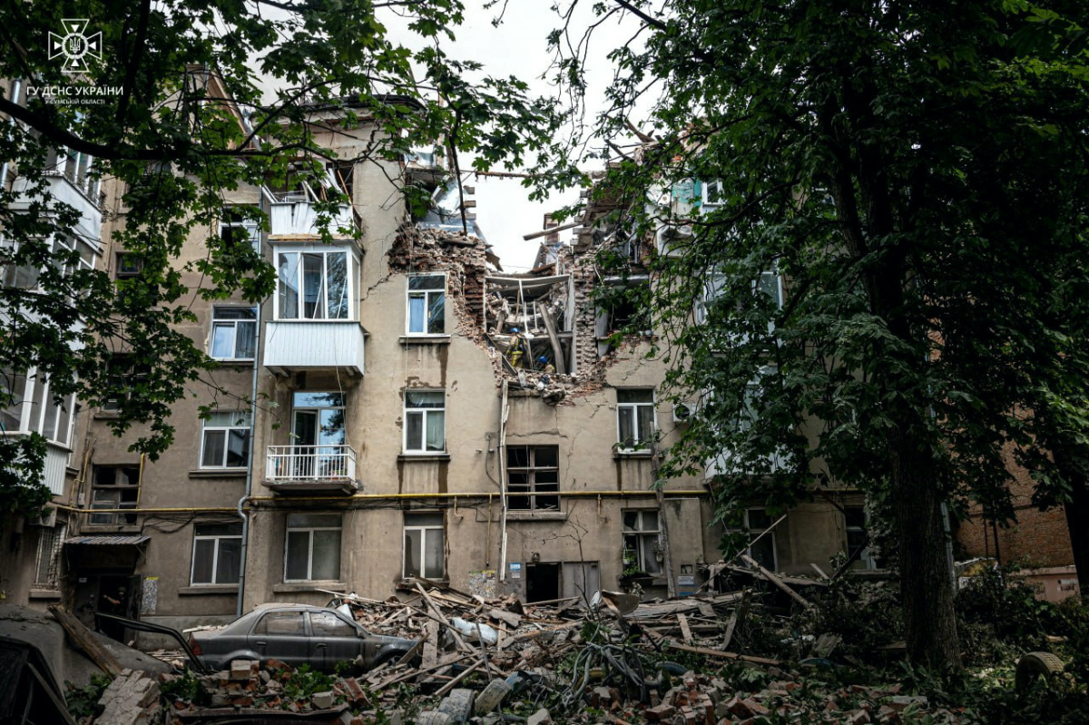 Rescues work at a site of a residential building hit by a suicide drone, which local authorities consider to be Iranian made unmanned aerial vehicles, Shahed-131/136, amid Russia's attack on Ukraine, in Sumy, Ukraine, on 3rd July, 2023. ,