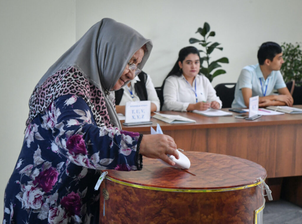 A woman votes in early presidential election in Tashkent, Uzbekistan, on 9th July, 2023.