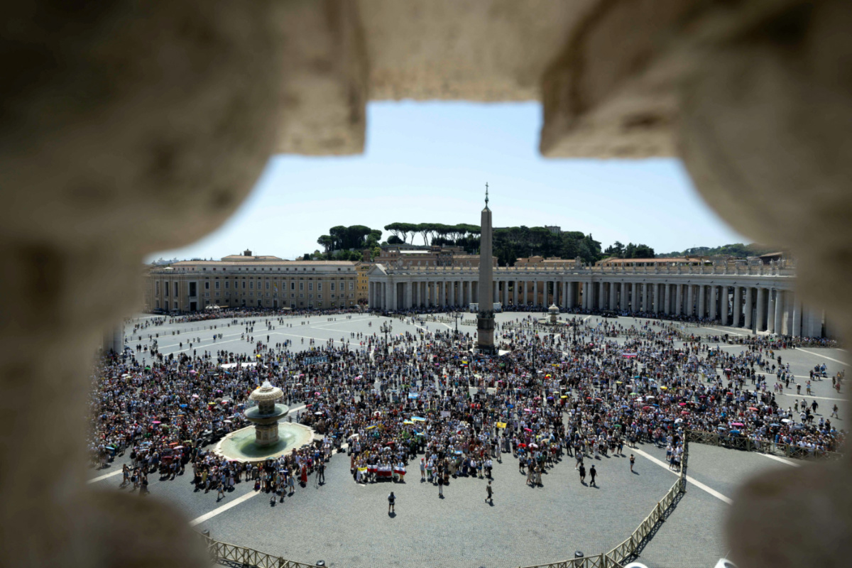 People gather to attend the Angelus prayer led by Pope Francis, at Saint Peter's Square, at the Vatican, on 9th July, 2023. 