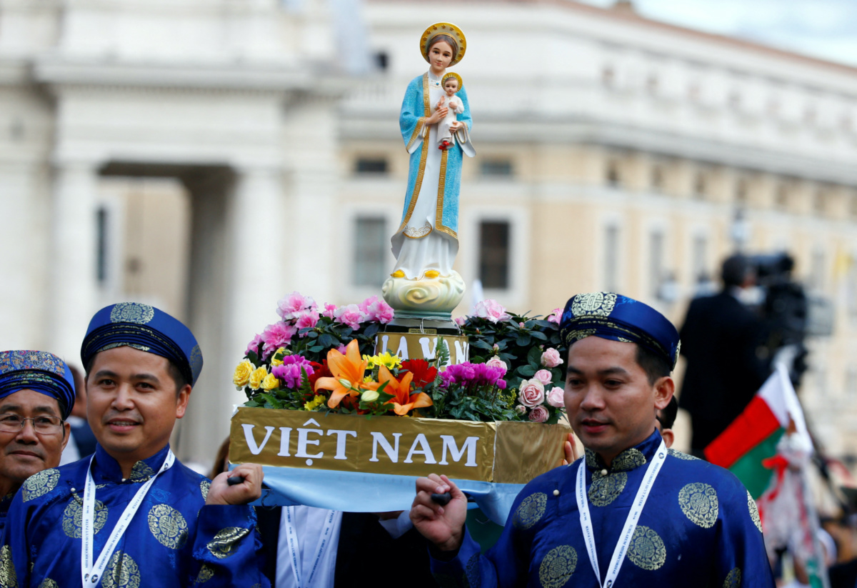 Pilgrims from Vietnam hold a statue of Our Lady during a Marian vigil prayer led by Pope Francis in Saint Peter's square at the Vatican, on 8th October, 2016. PICTURE: Reuters/Tony Gentile/File photo