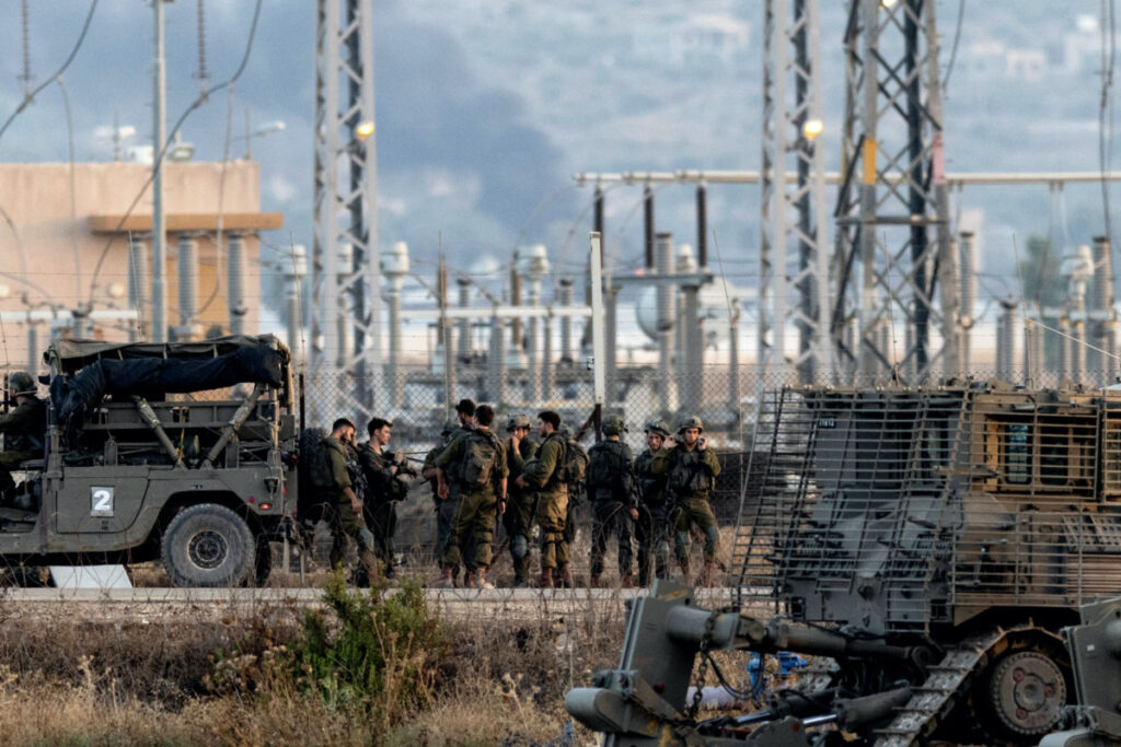 Israeli forces stand near a fence, as an Israeli military operation continues on Jenin refugee camp in the Israeli-occupied West Bank, on 4th July, 2023.