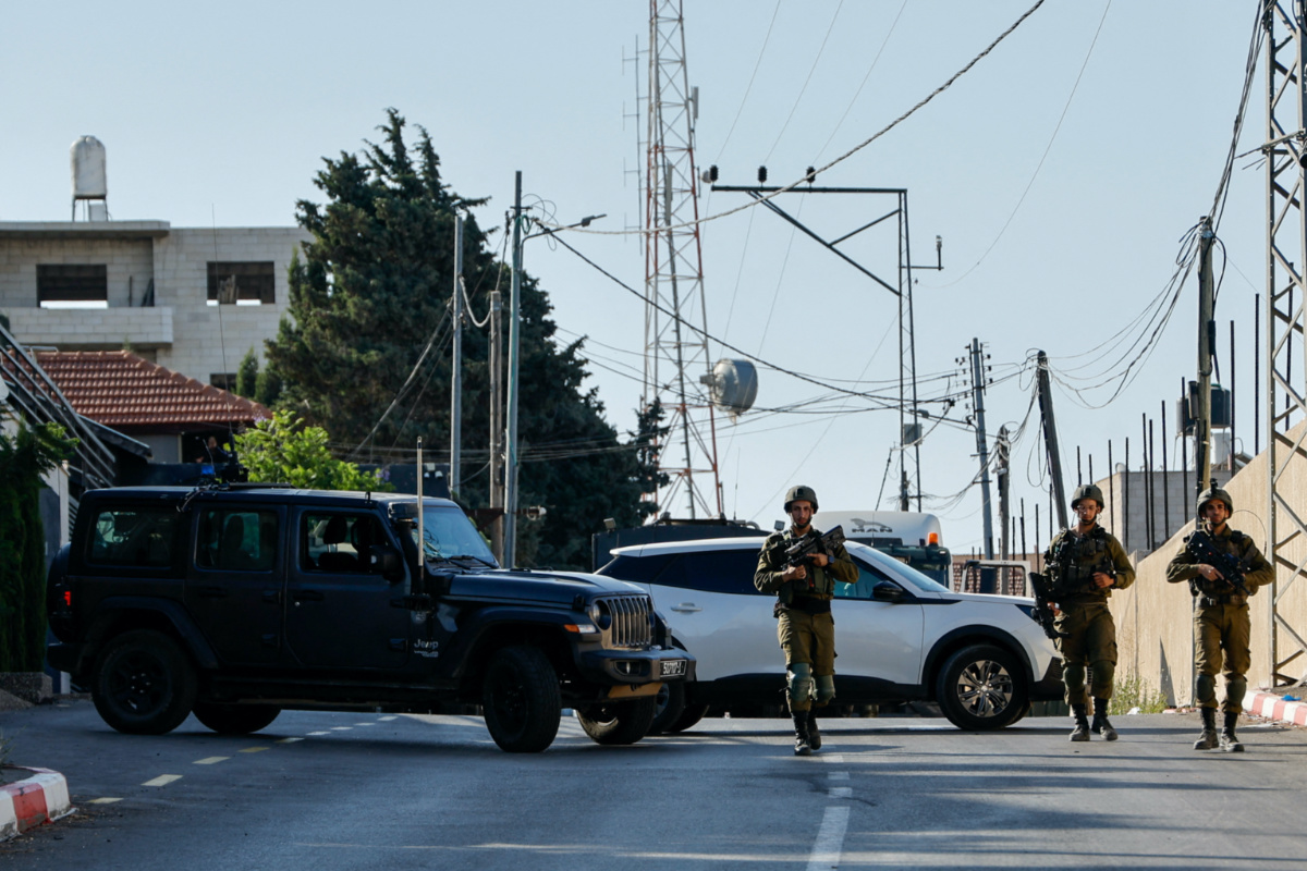 Israeli troops inspect the scene where, according to an Israeli military statement and Army Radio,  three Palestinians who fired at Israeli forces were killed by Israeli troops, in Nablus, in the Israeli-occupied West Bank, on 25th July, 2023. 