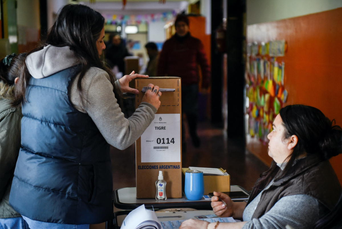 A woman casts her vote during Argentina's primary elections, in a polling station in Tigre, Buenos Aires, Argentina, on 13th August, 2023. 