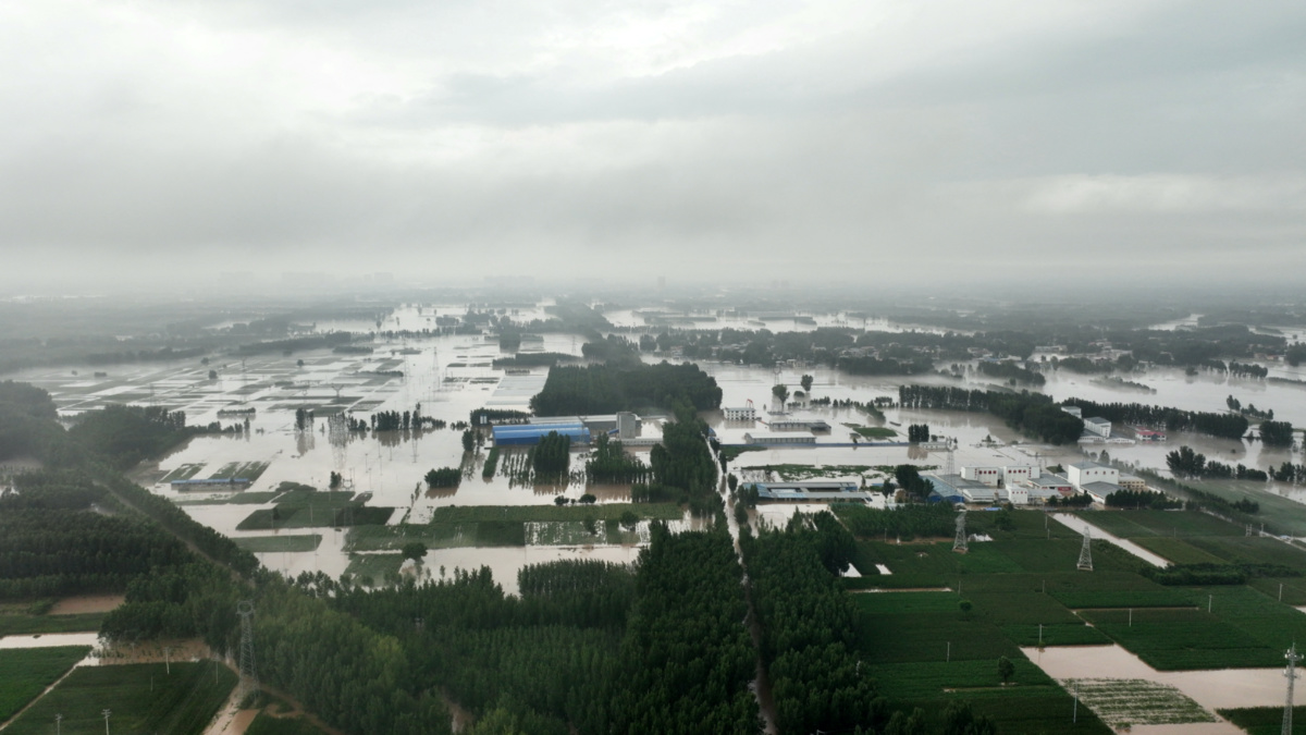 An aerial view shows flooded farmlands and houses near Tazhao village, following heavy rainfall in Zhuozhou, Hebei province, China, on 1st August, 2023. 