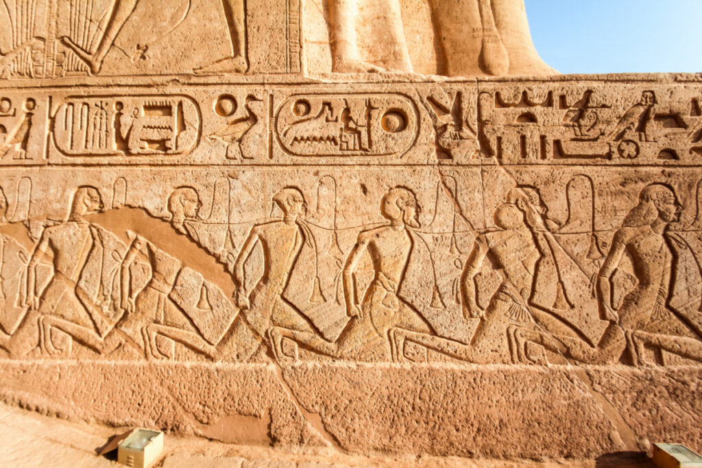 Egyptian relief of defeated and enslaved enemies at the temple of Abu Simbel, Egypt