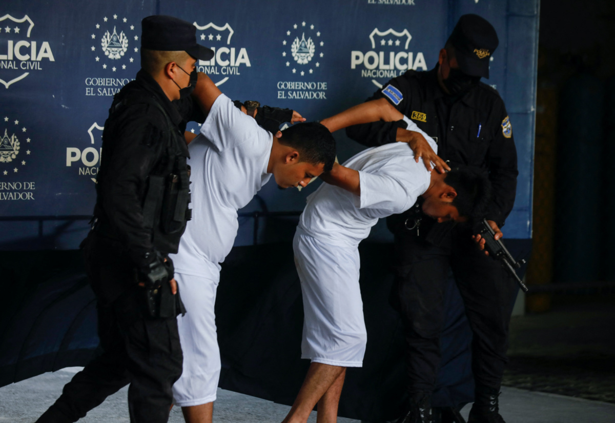Suspected members of the MS-13 gang Geovany Alexander Aldana Lopez and Roberto Carlos Aldana Lopez are presented to the news media after being detained in possession of weapons and ammunition, in Nuevo Cuscatlan, El Salvador, on 29th July, 2022