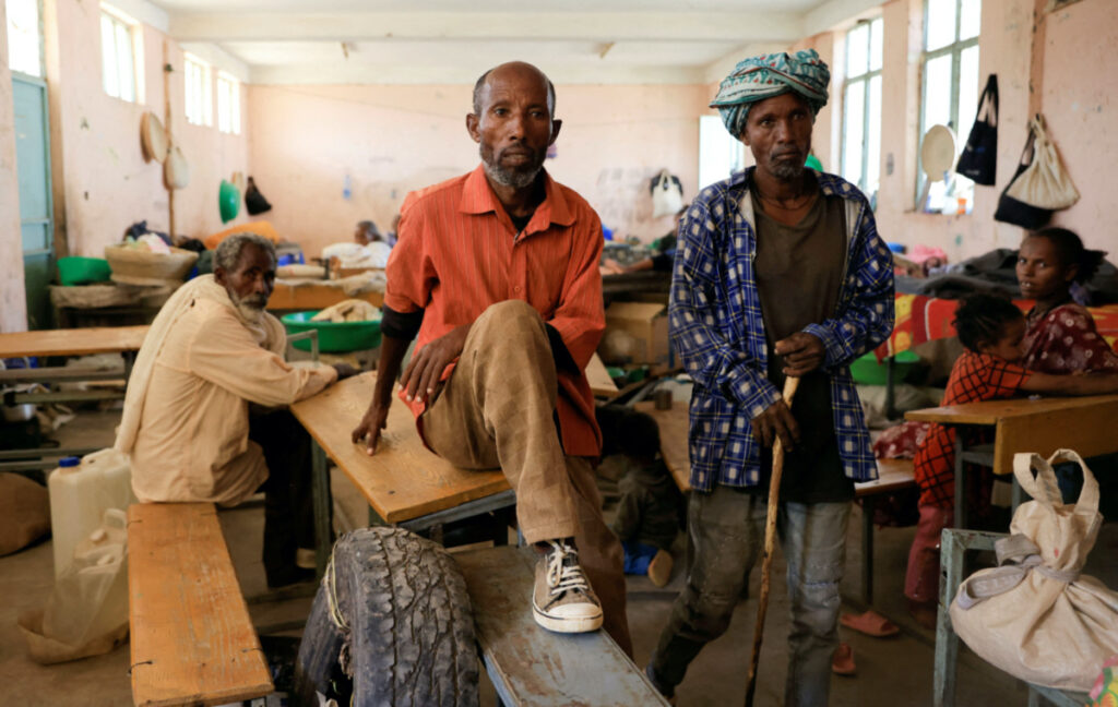 People displaced due to the fighting between Tigray People's Liberation Front and Ethiopian National Defence Force allied with Amhara Special Forces, sit inside their shelter at the Abi Adi camp for the Internally Displaced Persons in Abi Adi, Tigray Region, Ethiopia, on 24th June, 2023.