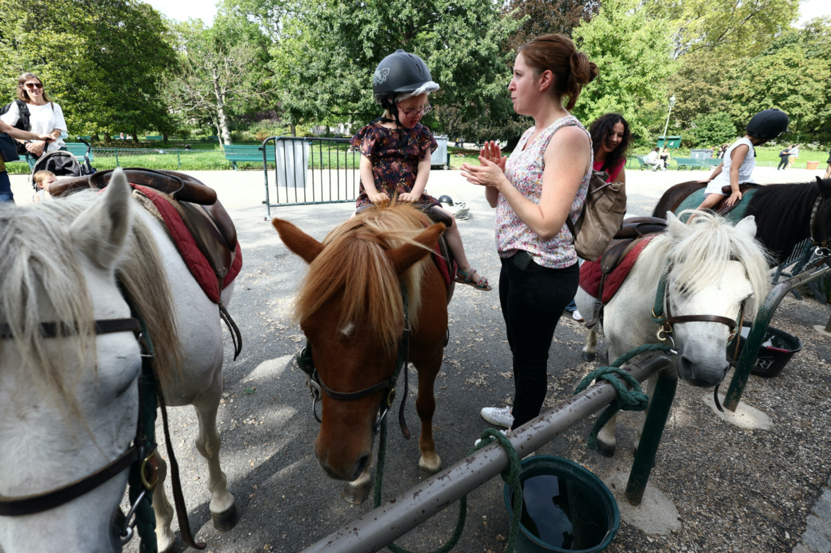 A child takes a pony ride on the Parc Monceau as the city of Paris is introducing a ban on pony-riding starting from 2025 after the animal protection association, Paris Animaux Zoopolis warned of shortcomings in animal welfare in Paris, France, on 16th August, 2023.