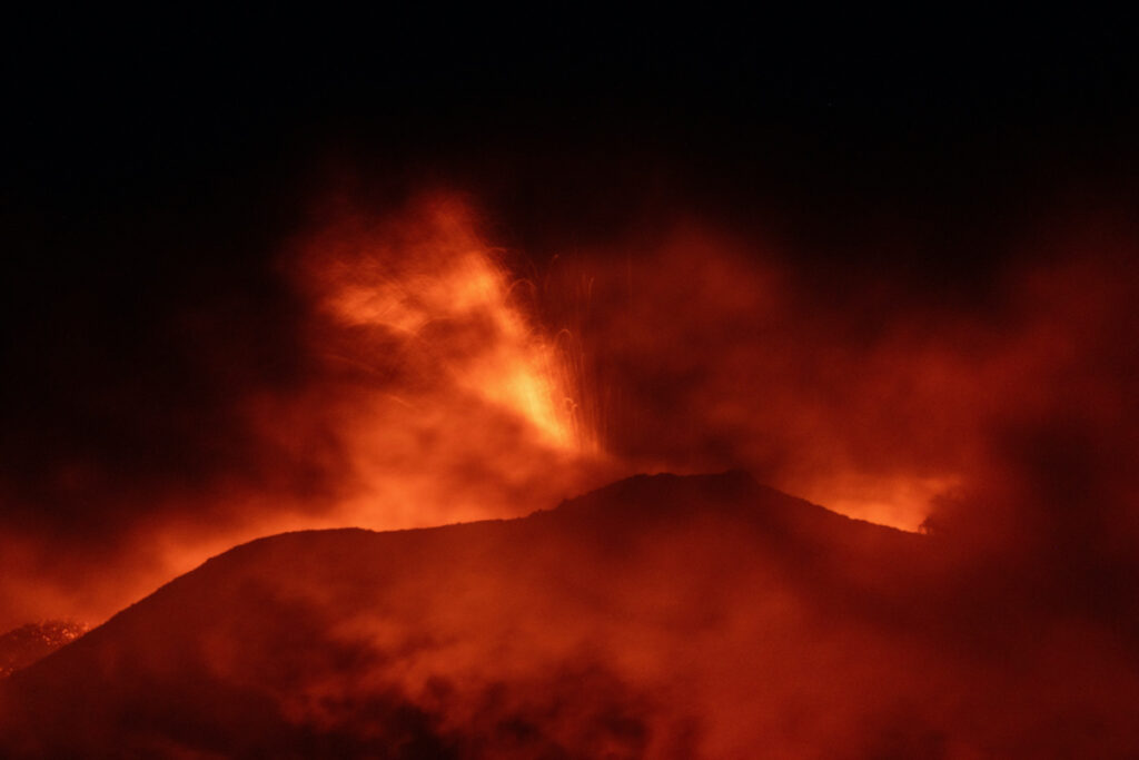 Mount Etna, Europe's most active volcano, lights up the night sky with eruptions as seen from Rocca Della Valle, Italy, on 13th August, 2023.