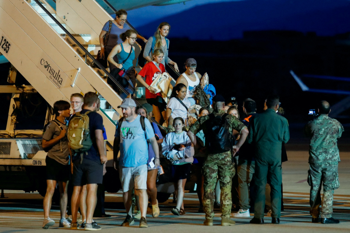 Italian nationals and other European and American citizens, who have been evacuated from Niger, days after a junta seized power in the west African country, arrive at Ciampino Airport, near Rome, Italy, on 2nd August, 2023.