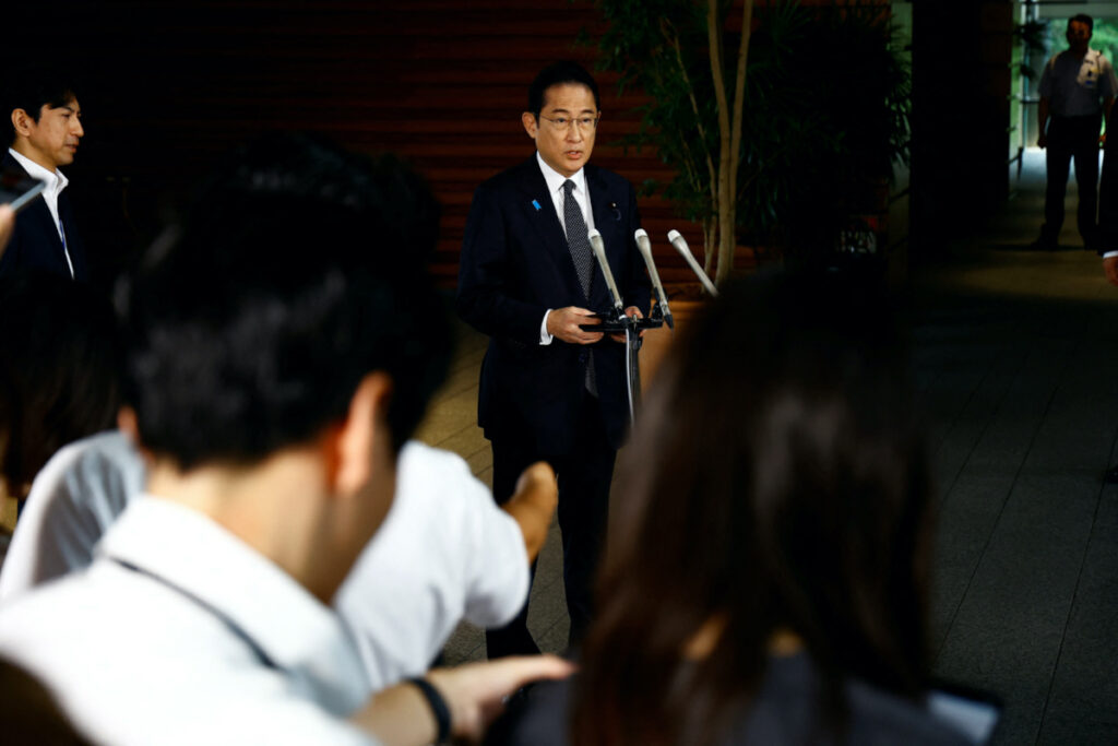 Japanese Prime Minister Fumio Kishida answers questions from journalists upon his arrival to Prime Minister's Office on 22nd August, 2023, in Tokyo, Japan