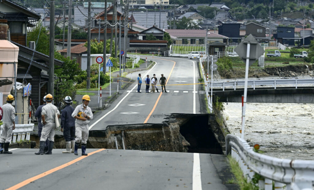 A collapsed road near the Saji River is pictured in Tottori, western Japan, after Typhoon Lan hit the region in this photo taken by Kyodo on 16th August, 2023.