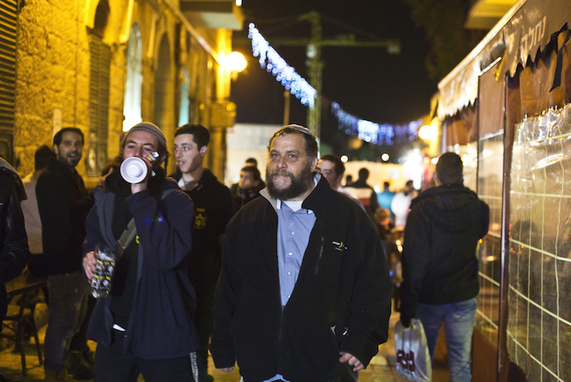 Benzion Gopshtein, leader of the far-right Israeli group Lehava, gathers with fellow activists in Jerusalem, on 25th December, 2014.