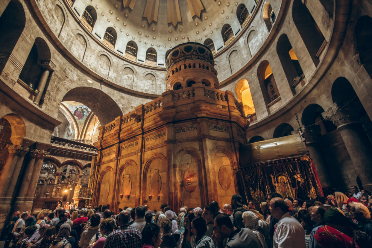 Piligrims at the Church of the Holy Sepulchre in Jerusalem, Israel - November 2017