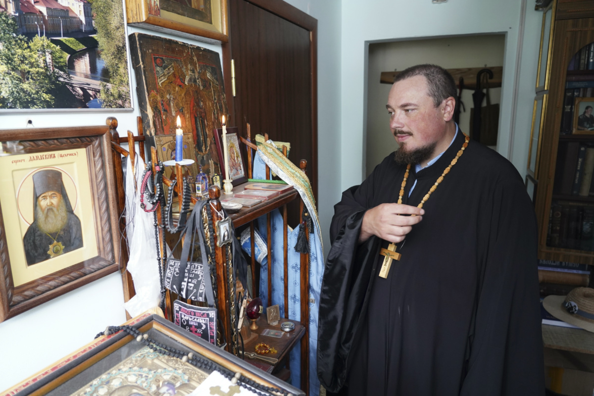 Rev Iakov Vorontsov crosses him at his apartment in Almaty, Kazakhstan on Wednesday, 9th August, 2023. 