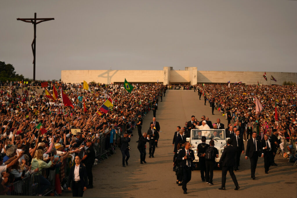 Pope Francis arrives surrounded by bodyguards at Our Lady of Fatima shrine in Fatima, central Portugal on Saturday, 5th August, 2023.