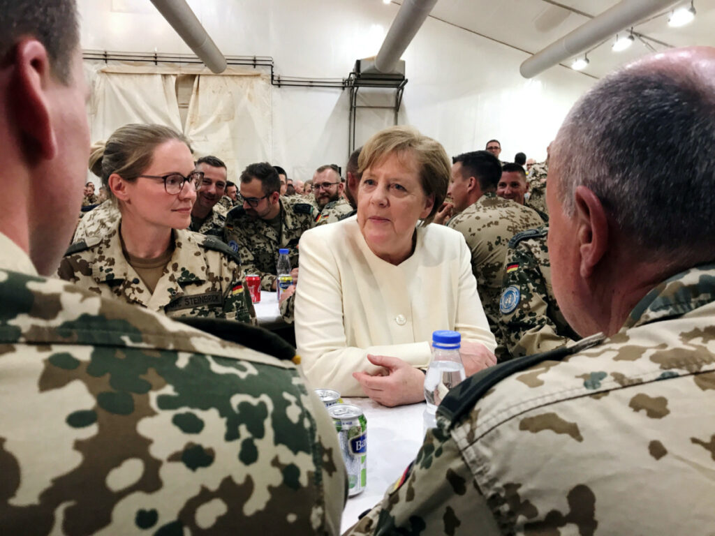 Then German Chancellor Angela Merkel talks with troops in Gao, Mali, on 2nd May, 2019