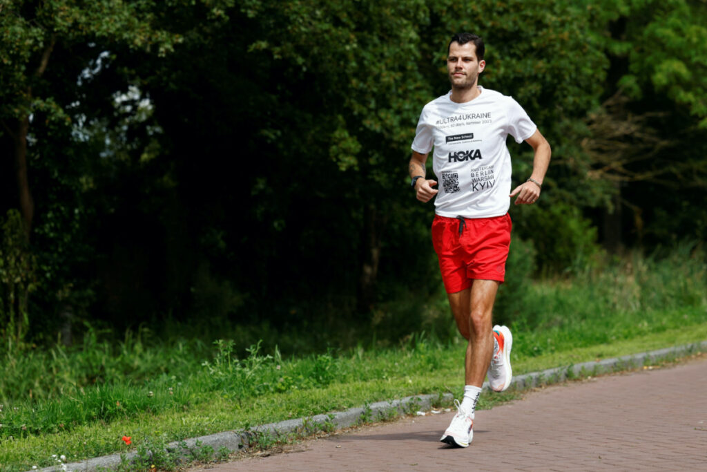 Dutch runner Boas Kragtwijk runs after an interview with Reuters in Amsterdam, Netherlands, on 21st July, 2023.