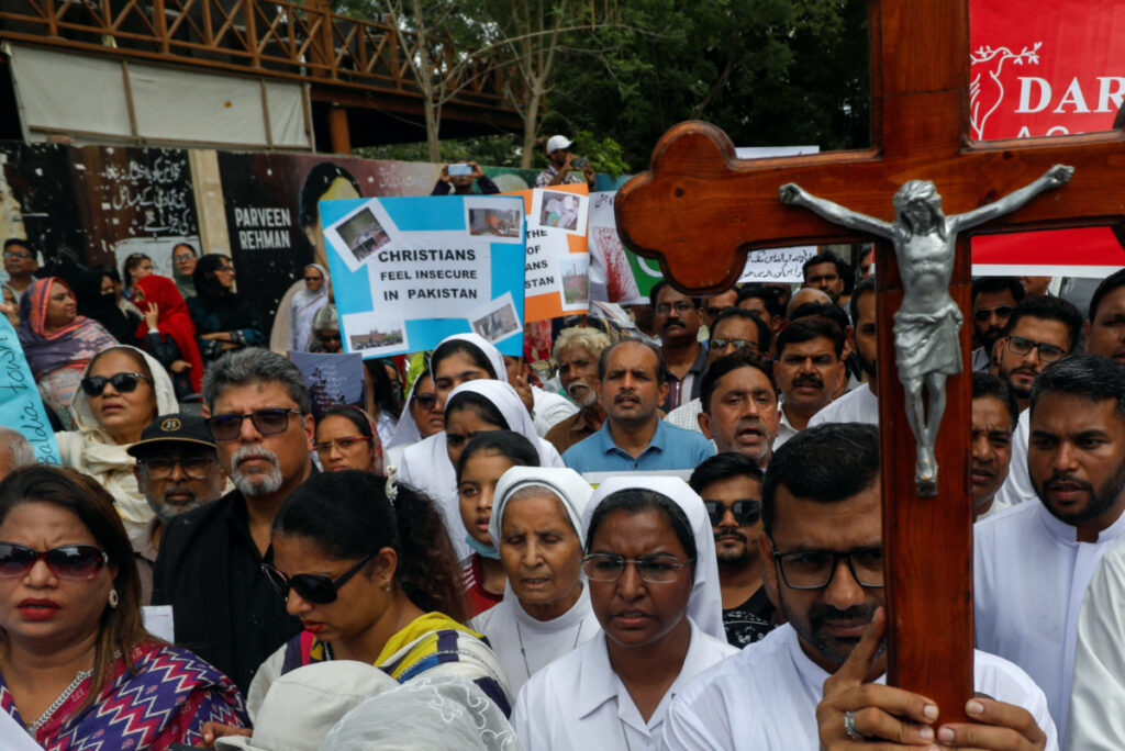 Members of the Christian community chant slogans as they gather to condemn the attacks on churches and houses in Jaranwala town of Faisalabad, during a protest in Karachi, Pakistan, on 18th August, 2023