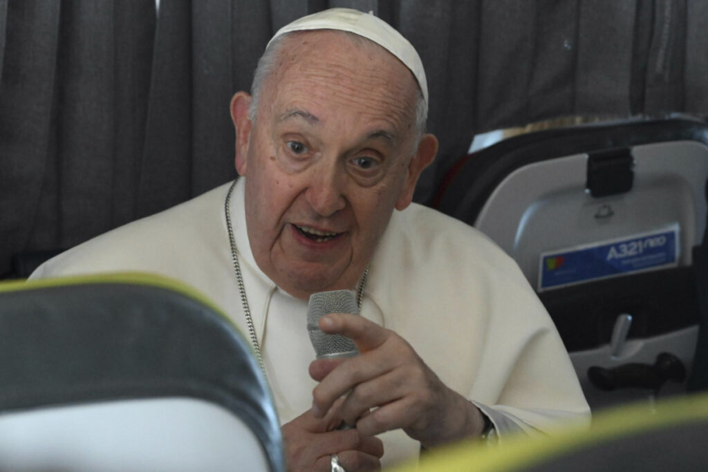 Pope Francis meets the journalists during a press conference aboard the airplane directed to Rome, at the end of the 37th World Youth Day in Lisbon, on Sunday, 6th August, 2023.