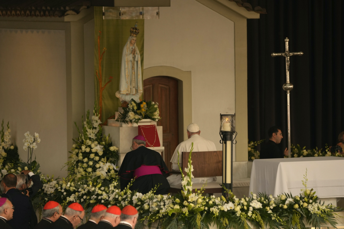 Pope Francis prays in front of the statue of Our Lady of Fatima at the shrine in Fatima, central Portugal, on Saturday, 5th August, 2023.