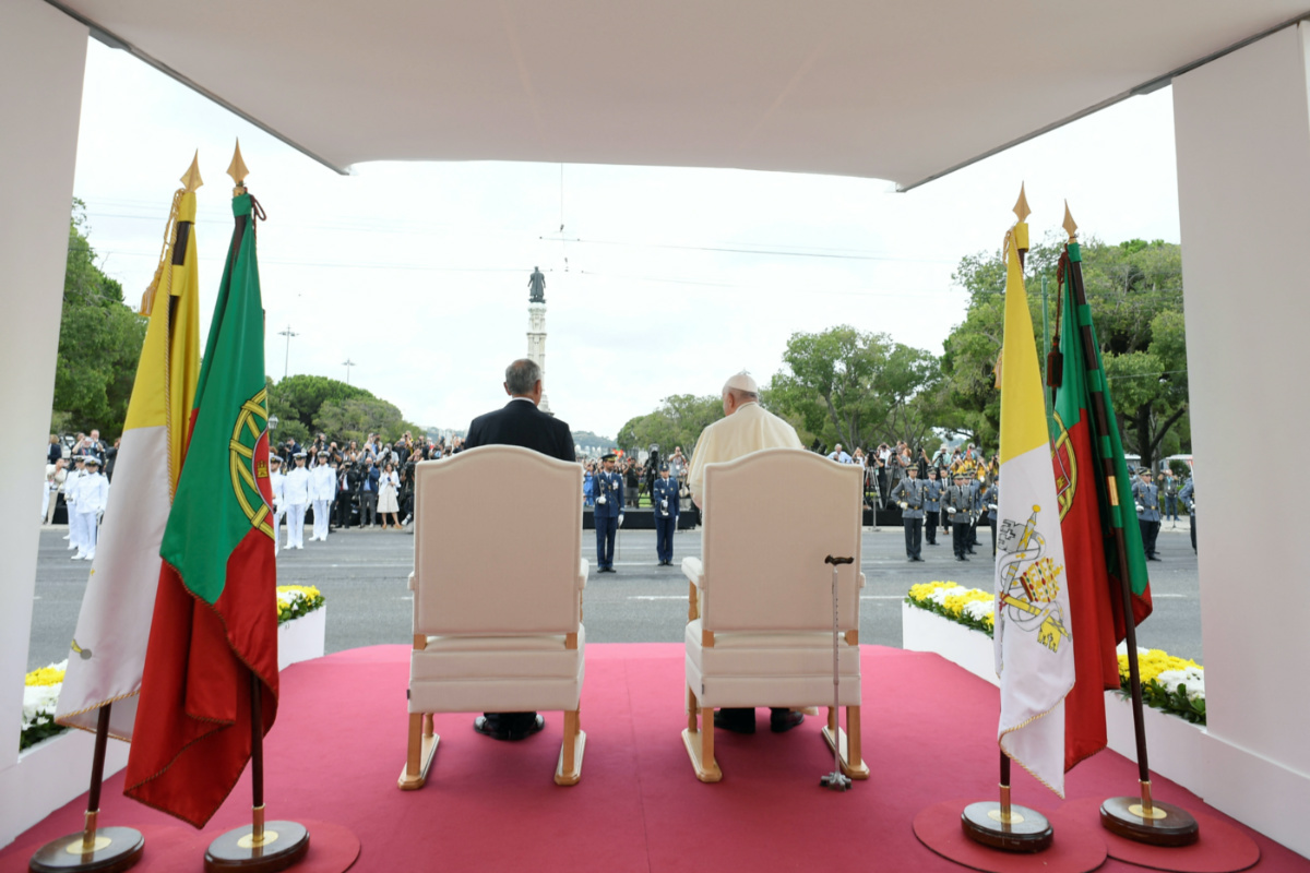 Pope Francis stands with Portugal's President Marcelo Rebelo de Sousa upon arrival during his apostolic journey to Portugal on the occasion of the XXXVII World Youth Day, in Lisbon Portugal, on 2nd August, 2023 in this handout image