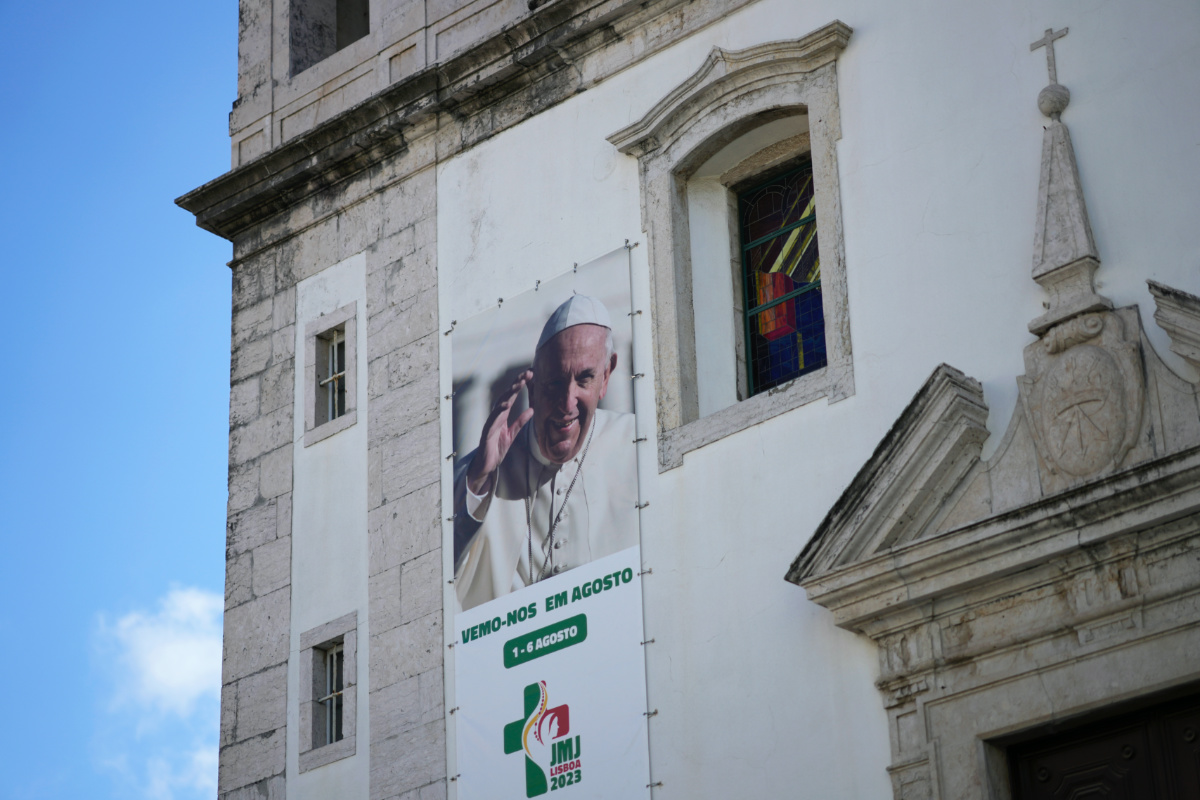 A banner on the outside of a church announces international World Youth Day from 1st to 6th August, in Lisbon, on Tuesday, 25th July, 2023.
