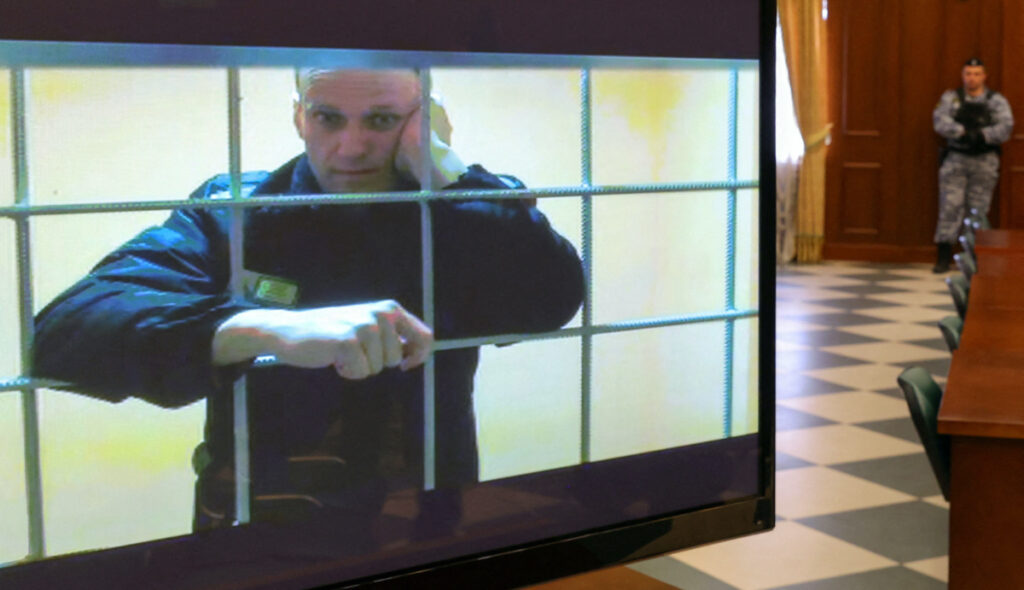Russian opposition leader Alexei Navalny is seen on a screen via a video link from the IK-2 corrective penal colony in Pokrov during a court hearing to consider an appeal against his prison sentence in Moscow, Russia, on 24th May, 2022.