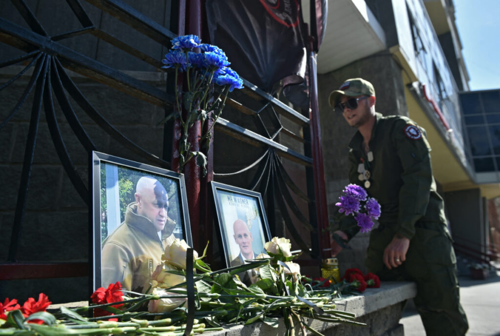 A view shows portraits of Russian mercenary chief Yevgeny Prigozhin and Wagner group commander Dmitry Utkin at a makeshift memorial outside the local office of the Wagner private mercenary group in Novosibirsk, Russia, on 24th August, 2023